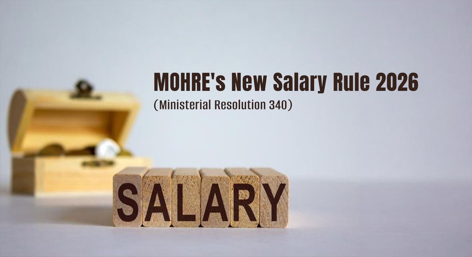 MOHRE's new salary rule 2026 under Ministerial Resolution 340 — wooden blocks spelling SALARY beside an open treasure chest